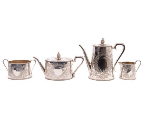 Fine quality Victorian four piece silver tea set - comprising teapot of oval drum form, with engraved fern decoration, scroll