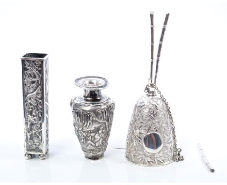 Late 19th / early 20th century Chinese silver brush container of tall form, decorated with panels of flowers, dragons, bamboo