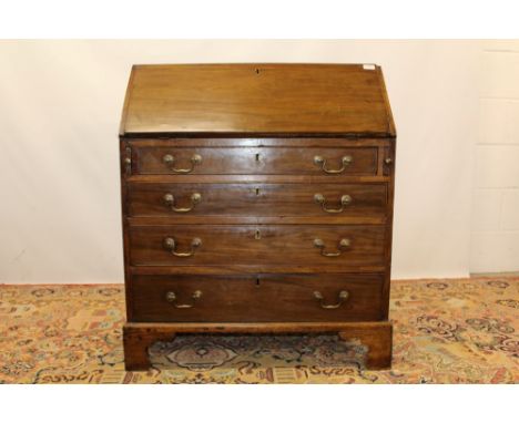 George III mahogany bureau with fitted interior about central cupboard door and four graduated drawers below, on bracket feet