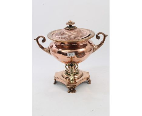 Regency copper and brass samovar with domed wrythen cover and twin scrolled handles, on shaped square base and bracket feet, 