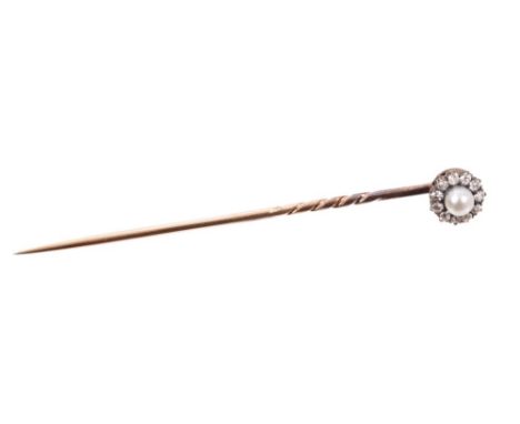 Victorian diamond and pearl stick pin, the central button-shape pearl measuring 3.92mm, surrounded by eleven old cut diamonds