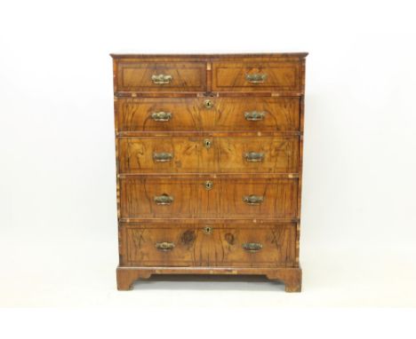 18th century and later walnut crossbanded high chest of drawers, having two short over four long graduated drawers, on bracke