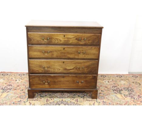 George III mahogany chest with four long graduated drawers, on bracket feet