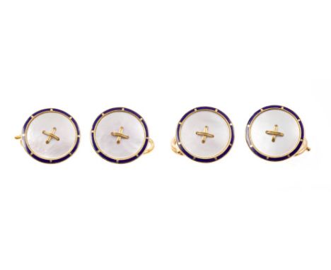 Set of four gold and mother of pearl dress studs with blue enamel edge, stamped '18ct', 14mm diameter