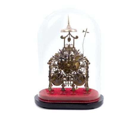 An impressive mid-19th century English skeleton clock, the pierced brass Gothic Cathedral-shaped frame with twin fusee moveme