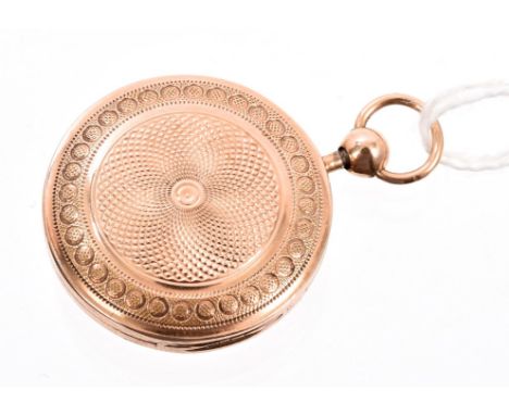 19th century yellow metal vinaigrette in the form of a circular pendant / locket with engine-turned decoration