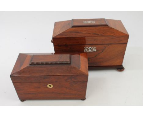 Late Regency rosewood tea caddy of sarcophagus form, on squat bun feet, together with another similar (2)