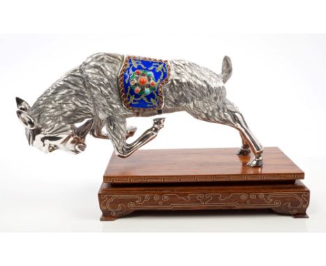 Unusual Far Eastern white metal model of a charging goat with cloisonné enamel saddle, on a wire-inlaid wooden stand (horns n