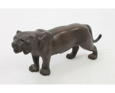 Japanese Meiji bronze figure of a tiger modelled in standing pose, two character signature to underside, 19cm long