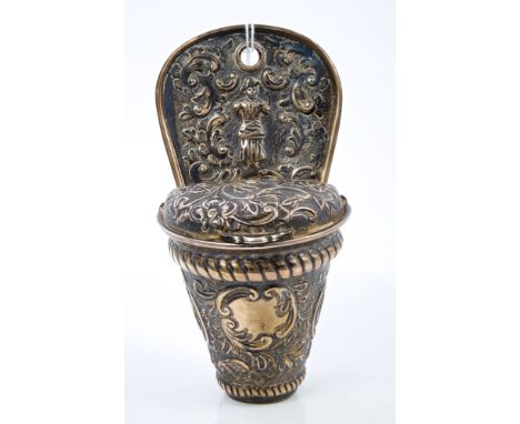 Victorian silver stoup of conical form, with raised foliate decoration, scrolled panels with figures, vacant cartouche and ro