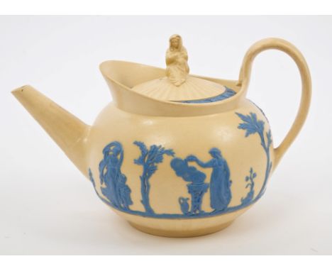 Early 19th century Wedgwood smear glazed cane ware teapot and cover, circa 1815 - 1820, with moulded classical figure decorat