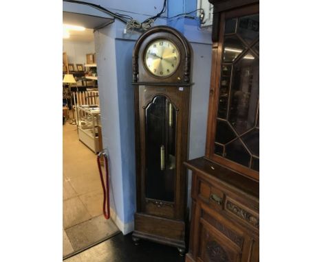 A walnut cased 1930's long case clock