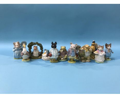 Eleven Beswick Beatrix Potter figures and one other