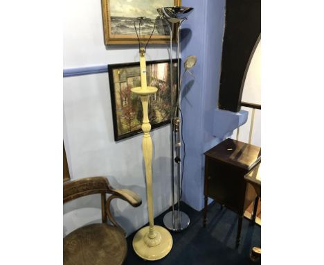A modern uplighter and cream standard lamp