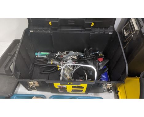 A mixed collection of tools to include a boxed Makita Angle Grinder, a Stabila Spirit Level, pliers and other tools housed in
