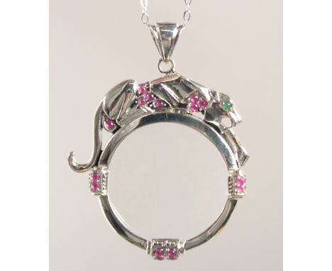 A SILVER ART DECO STYLE PANTHER RUBY SET SPY GLASS AND CHAIN.