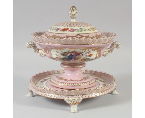 A CONTINENTAL PINK PORCELAIN CIRCULAR TUREEN, COVER AND STAND.