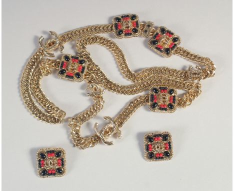 A LONG CHANEL GILDED CHAIN with enamel badges, 40cm long and A PAIR OF MATCHING EARRINGS.