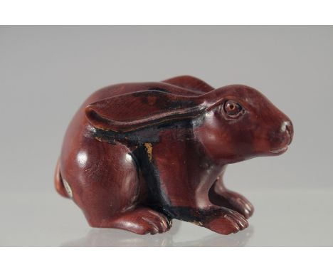 A CARVED WOOD NETSUKE, RABBIT 2.5ind , signed.