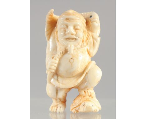 A CARVED BONE NETSUKE, FISHERMAN.