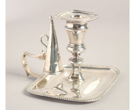 A GEORGE III RECTANGULAR CHAMBER CANDLESTICK AND SNUFFER with graduated edge. 5.5ins wide. London 1808.