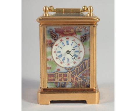 A MINIATURE BRASS IMARI PATTERN CARRIAGE CLOCK.2.25ins.