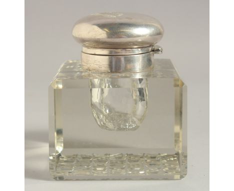 A LARGE SQUARE GLASS INKWELL with silver top. 3.75ins wide, Birmingham 1942.