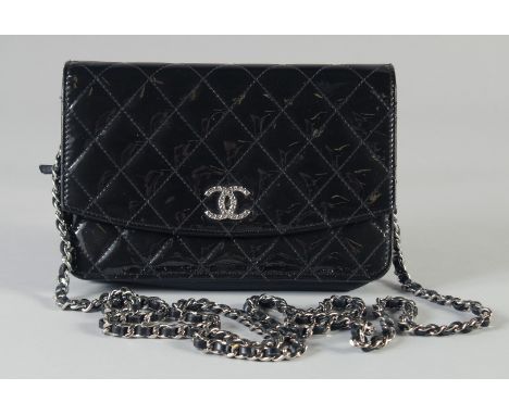 A GOOD CHANEL BLACK PATENT LEATHER SHOULDER BAG with chrome double C. 19cm long, 13cm high, chain strap, 64cm long.