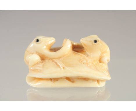 A CARVED BONE FROG NETSUKE. 1.5ins.