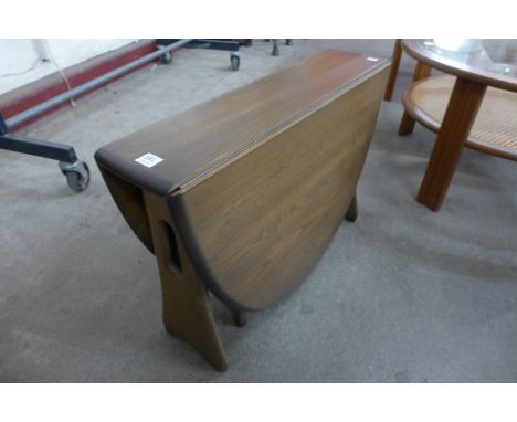 A small Ercol drop-leaf table