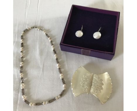 2 items of costume jewellery set with fresh water pearls together with a vintage glass belt buckle. Necklace set with freshwa