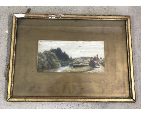 A Framed an glazed watercolour of a village river scene. Signed R. Rayment.  Approx 17 x 34.5cm.