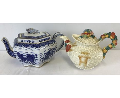 A Clarice Cliff Newport Pottery with a Copeland teapot. Clarice Cliff in Harvest design, Copeland with Auld Lang Syne motto. 