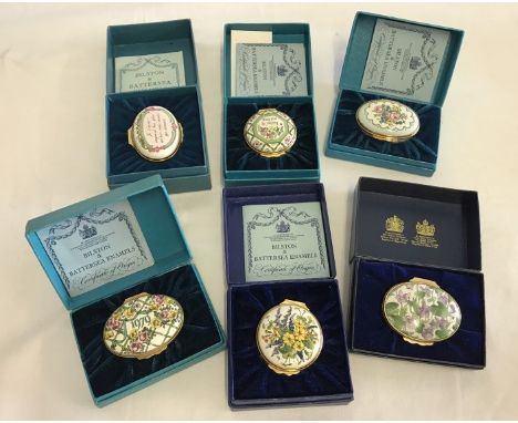 6 boxed Halcyon Days enamelled trinket/pill boxes by Bilston and Battersea enamels. To include Je t'aime and May you be happy