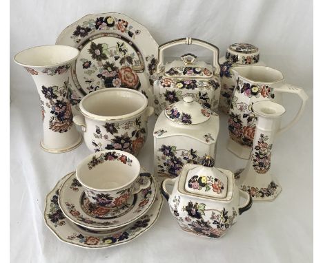 A collection of Mason's Ironstone ceramics in the Mandarin pattern. Comprising: Ginger jar, dinner plate, tea pot, candlestic