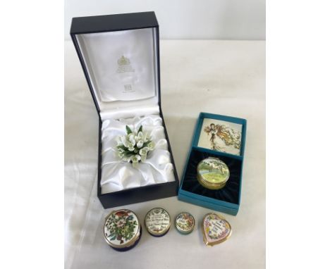 2 boxed and 4 unboxed Halcyon Days enamelled trinket/pill boxes by Bilston and Battersea enamels. To include The Snowdrop and