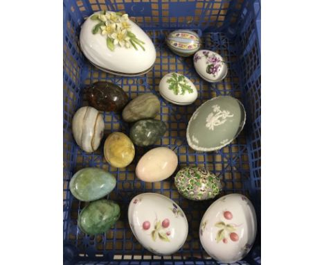 A box of assorted ceramic and natural stone eggs and egg shaped trinket boxes. To include Coalport, Limoges and Wedgwood. 