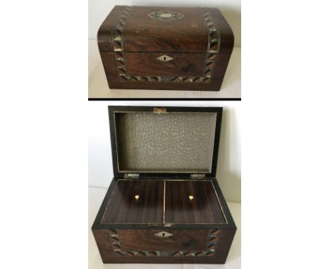 A mahogany curved lidded tea caddy. With inlaid banding containing abalone shell, and central inlaid design. 2 lidded compart