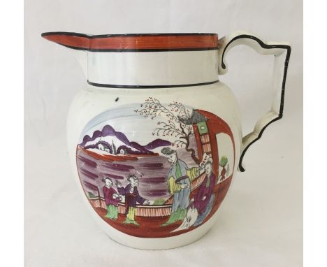 An early 19th century Pearl ware jug with Chinoiserie decoration. Probably Harley. Shows some signs of restoration. Approx. 1