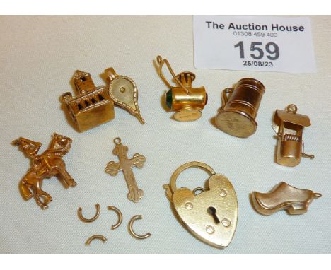 9ct gold charms for bracelet, inc. a Stanhope Lords prayer church charm, a wishing well, ship's lamp, cavalry soldier, tankar