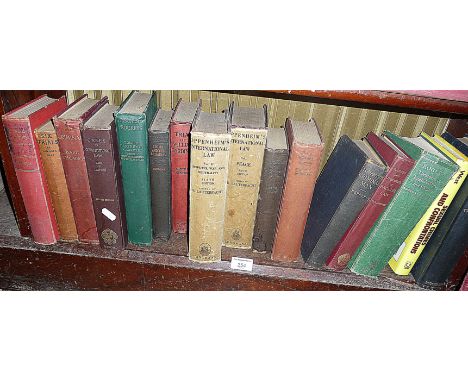 Shelf of old law books, inc. "Insanity and the Criminal", 1st Edition, 1923, and "Oppenheims International Law", etc.