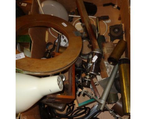 Assorted old photographic equipment and a desk lamp