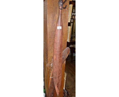 Tribal Art: Australian aboriginal woomera in red ochre and having gum handle, 3ft long. Together with a large antique aborigi