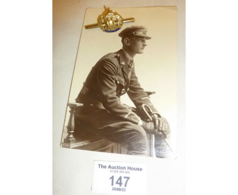 WW1 Dorsetshire Regiment enamel badge with postcard depicting the previous owner (from Bridport)