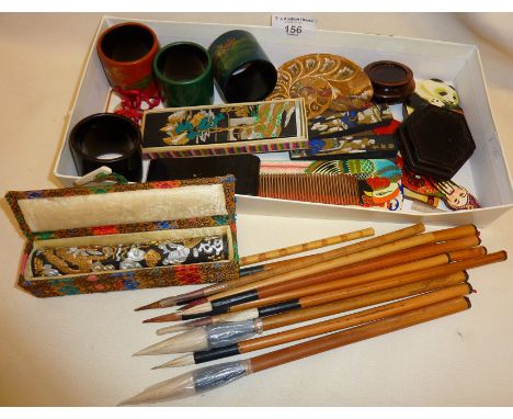 Chinese bamboo calligraphy brushes, painted napkin rings, scroll weights, etc.