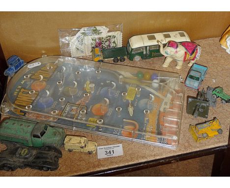 A Mar Toys Planet Patrol plastic bagatelle game and some diecast vehicles