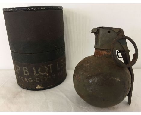 Vietnam war style inert US M-67 baseball grenade and transportation tube.  