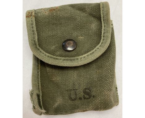 A WWII style US First Aid tin/compass canvas pouch.  