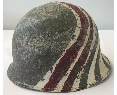 A French M51 OTAN (NATO) steel helmet with hand painted markings.  From a private collection.