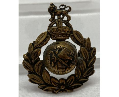 A WWII style Royal Marine Commando cap badge with hidden  compass to reverse.  Approx. 5 x 4cm.
